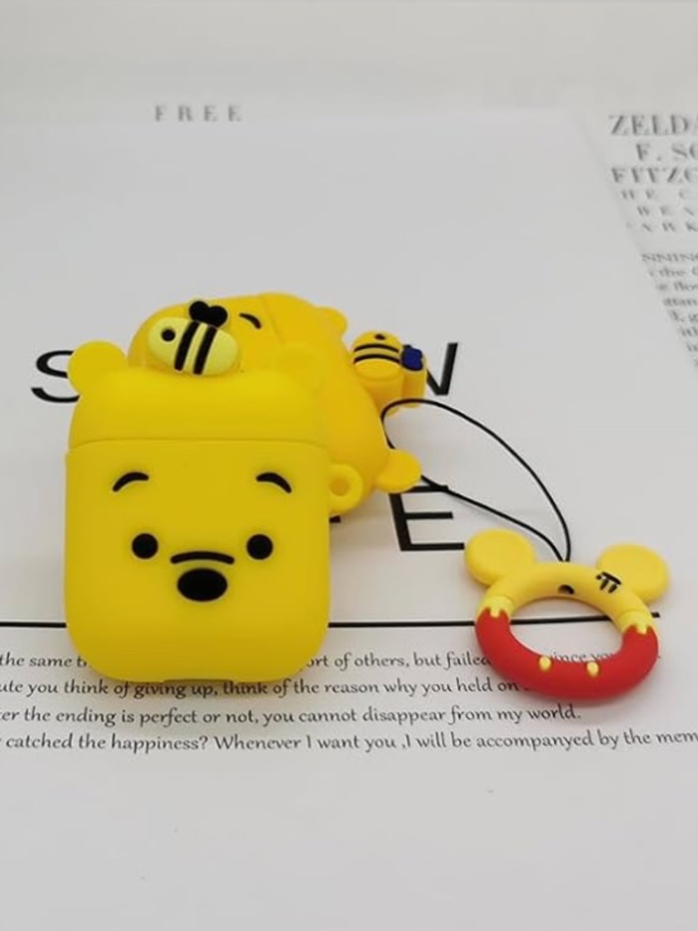 Yellow Winnie the Pooh Silicone AirPods Case with Red Ring Charm Gen 1+2 - Picture 3 of 6